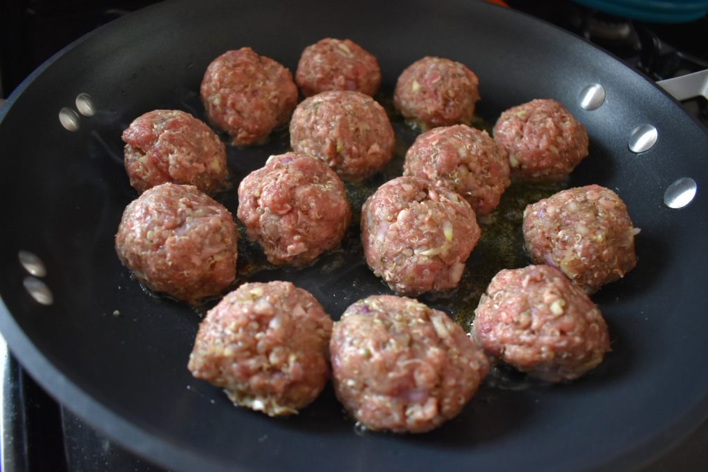Grass Fed Beef and Quinoa Meatballs cooking