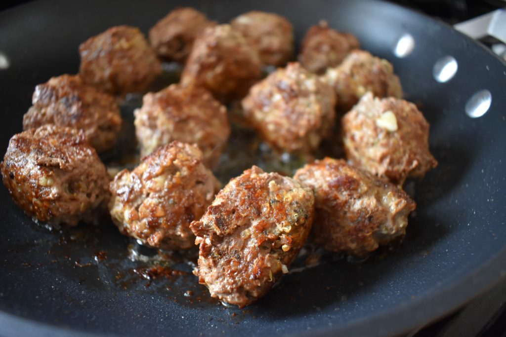 Grass Fed Beef and Quinoa Meatballs cooking