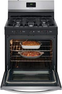 Frigidaire Gas Range with Food Tray inside.